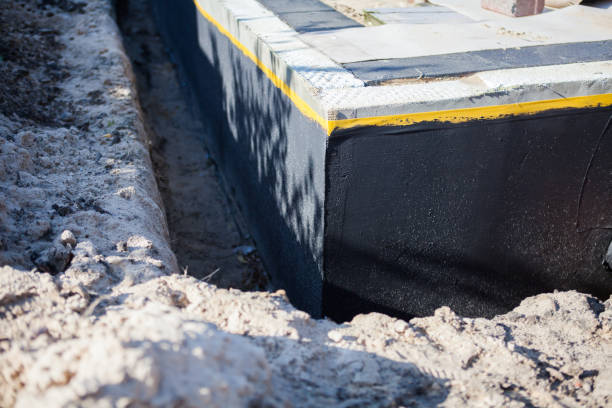 Professional Interior Drainage System technician working in Auburn, GA